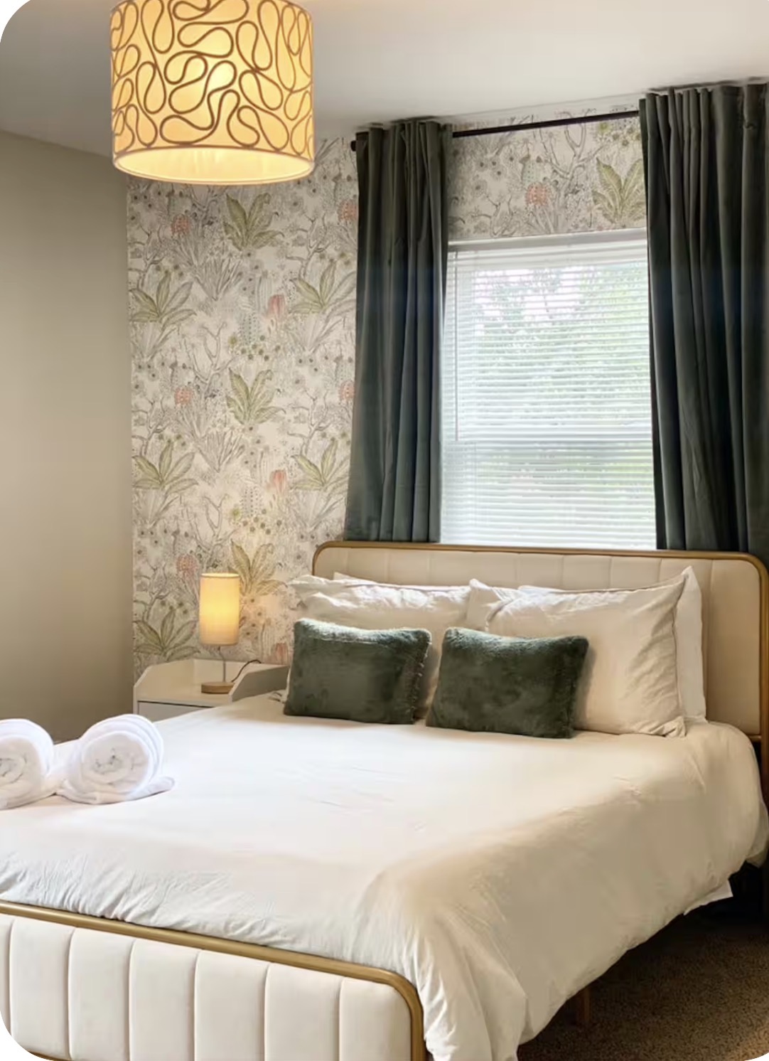 Short-term rental bedroom cleaned and staged by Sparkle Squad